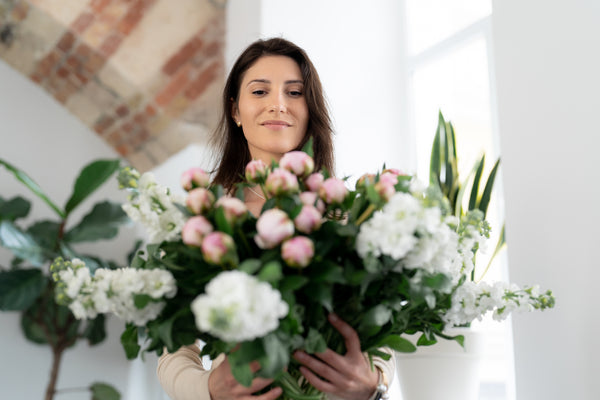 woman choosing flowers for her event